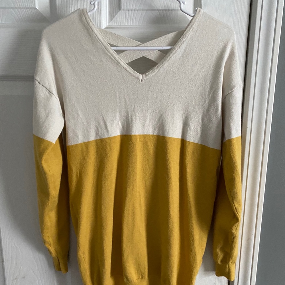 yellow and white criss cross sweater